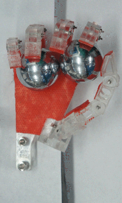 The dummy hand manually posed for a motion sequence of manipulating rehabilitation training balls